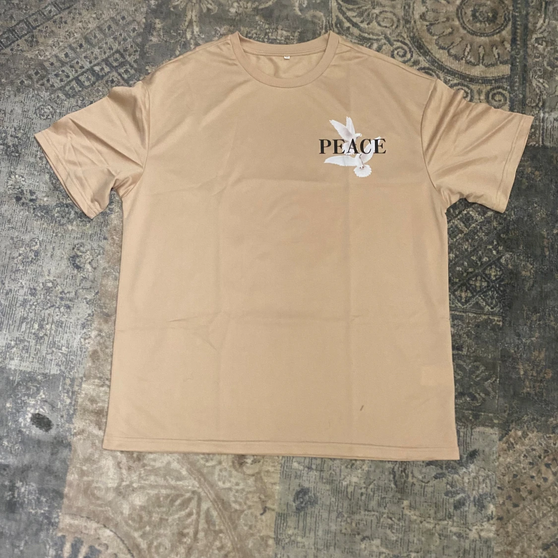 Beige PEACE t-shirt med duvor - 1