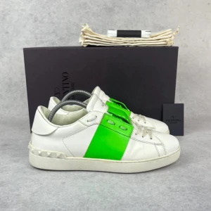 Valentino open sneaker - – Condition: 8/10  – Color: White and neon  – What is included: Only the sneakers  – Retail price: 7280