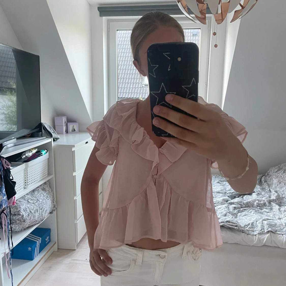 Ljusrosa volangblus från Nelly