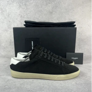 Saint Laurent SL/06 sneaker - – Condition: 9/5/10 - used twice  – What is included: Dustbag & card  – Retail price: 7100 SEK