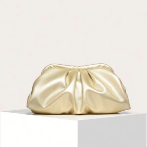 Guldig väska - Helt ny använd en gång. Rymmer väldigt mycket och super fin