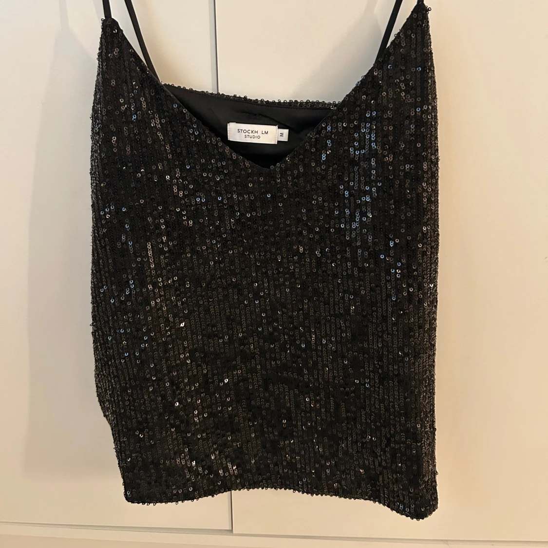 Svart paljettopp  - 1