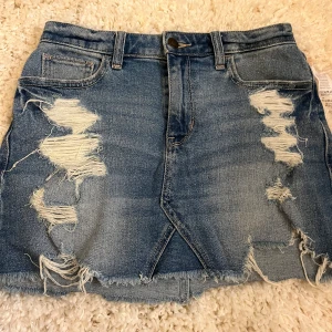 lågmidjad jeanskjol - jötte snygg lågmidjadad jeanskjol 