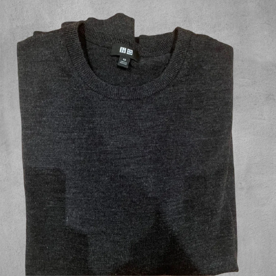 Grå merinoull tröja från Uniqlo