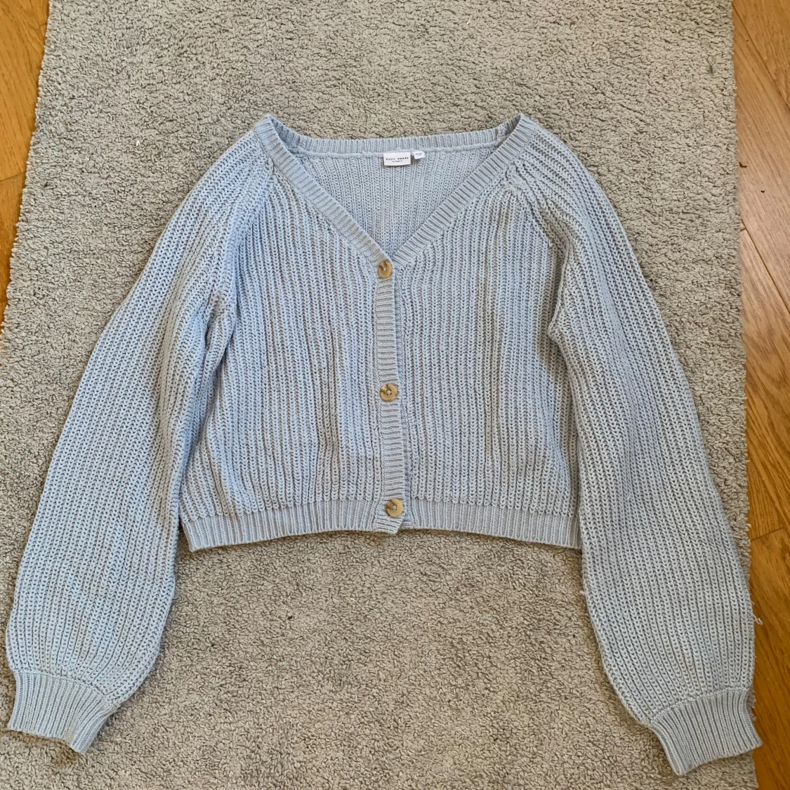 Ljusblå stickad kofta från Name It
