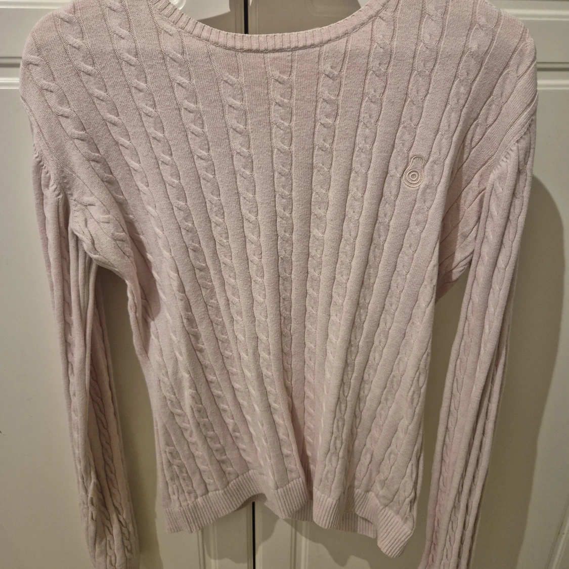 Ljusrosa kabelstickad tröja Sail Racing