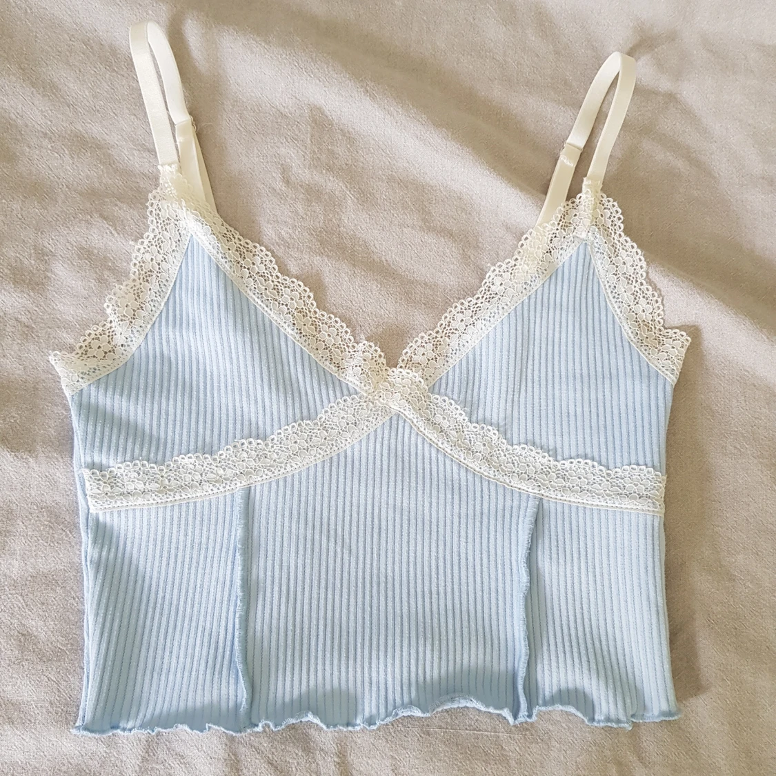 Ljusblå ribbad linnetopp 