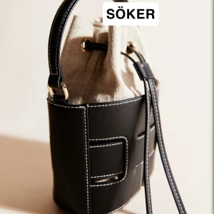 söker hm bucket bag - gärnast i svart