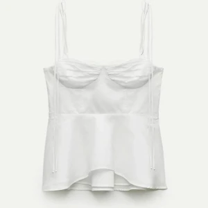 Toppar - Vit snygg topp som inte säljs längre