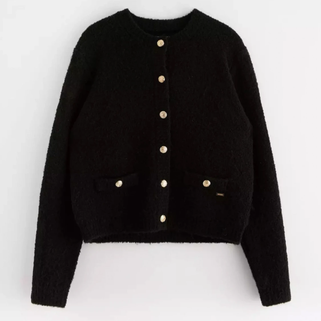 svart kofta med guldddetajer från lindex