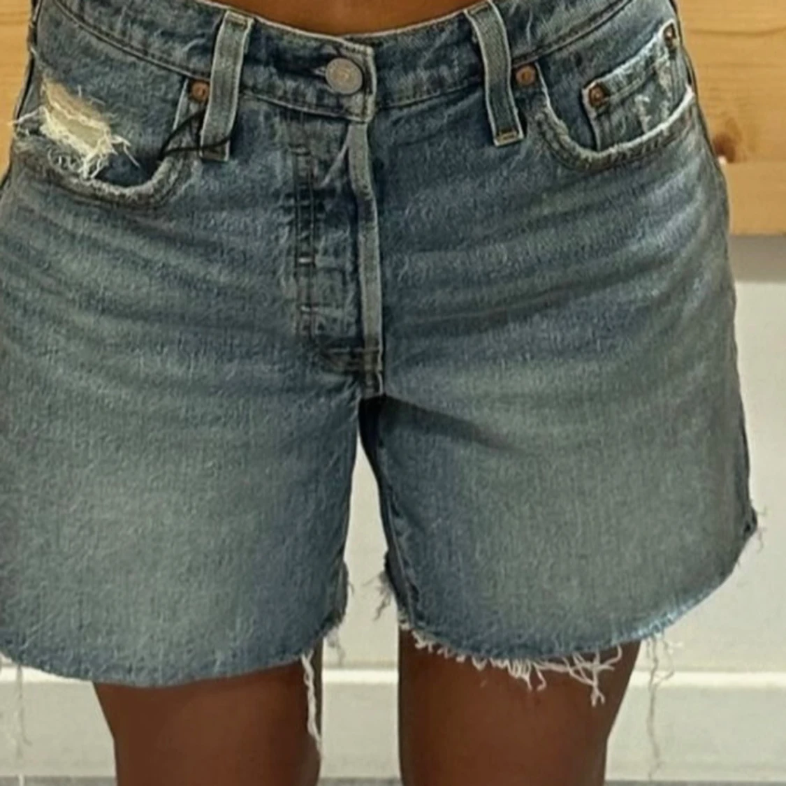 Levi's ljusblå jeansshorts med fransar
