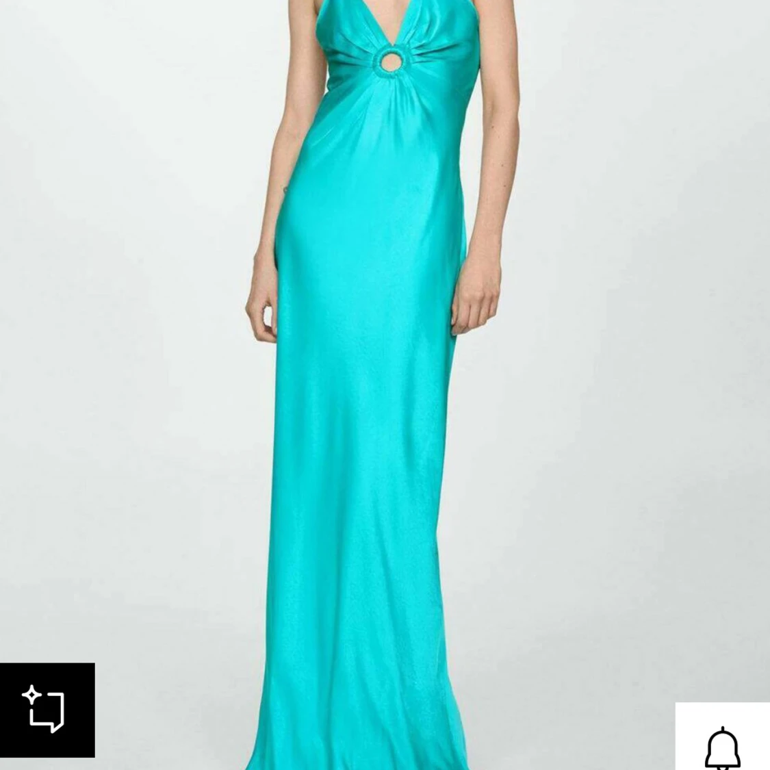 Turkos långklänning med ringdetalj - 1