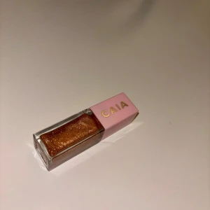 CAIA golden gloss  - Använd vid ett tillfälle, inte min färg tyvärr! 