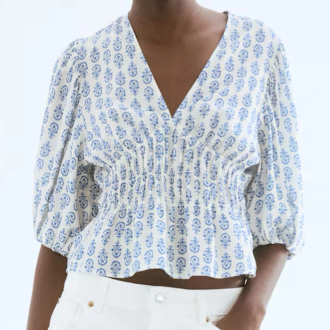 Blommig croppad blus med puffärm - 2