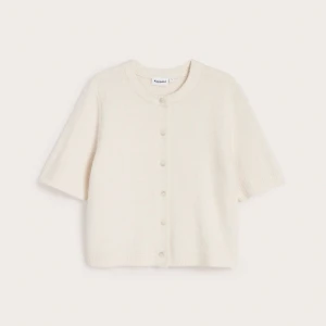 Stickad tröja - Stickad kortärmad tröja med knappar framtill, använd 1 gång😊