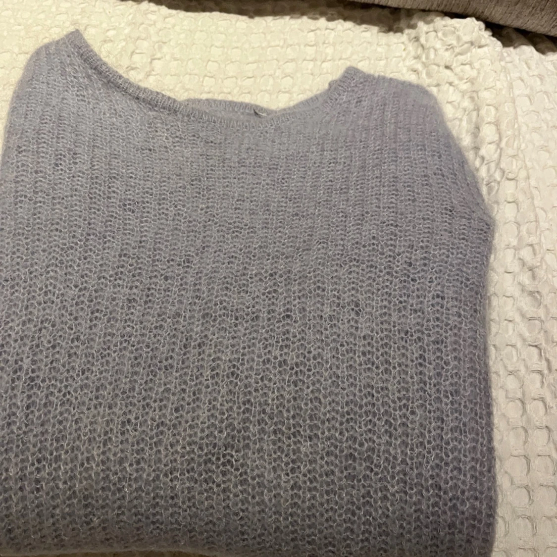 Himmelblå stickad tröja