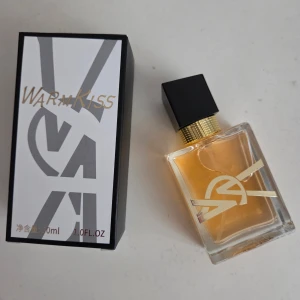 Yves Saint Laurent Libre - En parfymflaska med tillhörande förpackning. Flaskan innehåller 30 ml parfym.