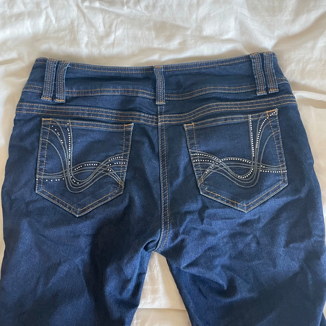 Mörkblå bootcut jeans från Diamond Denim