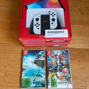 Nintendo Switch OLED + 2 spel - Hej, Jag säljer min Nintendo switch oled fortfarande ny och i perfekt skick. Frakt möjlig 