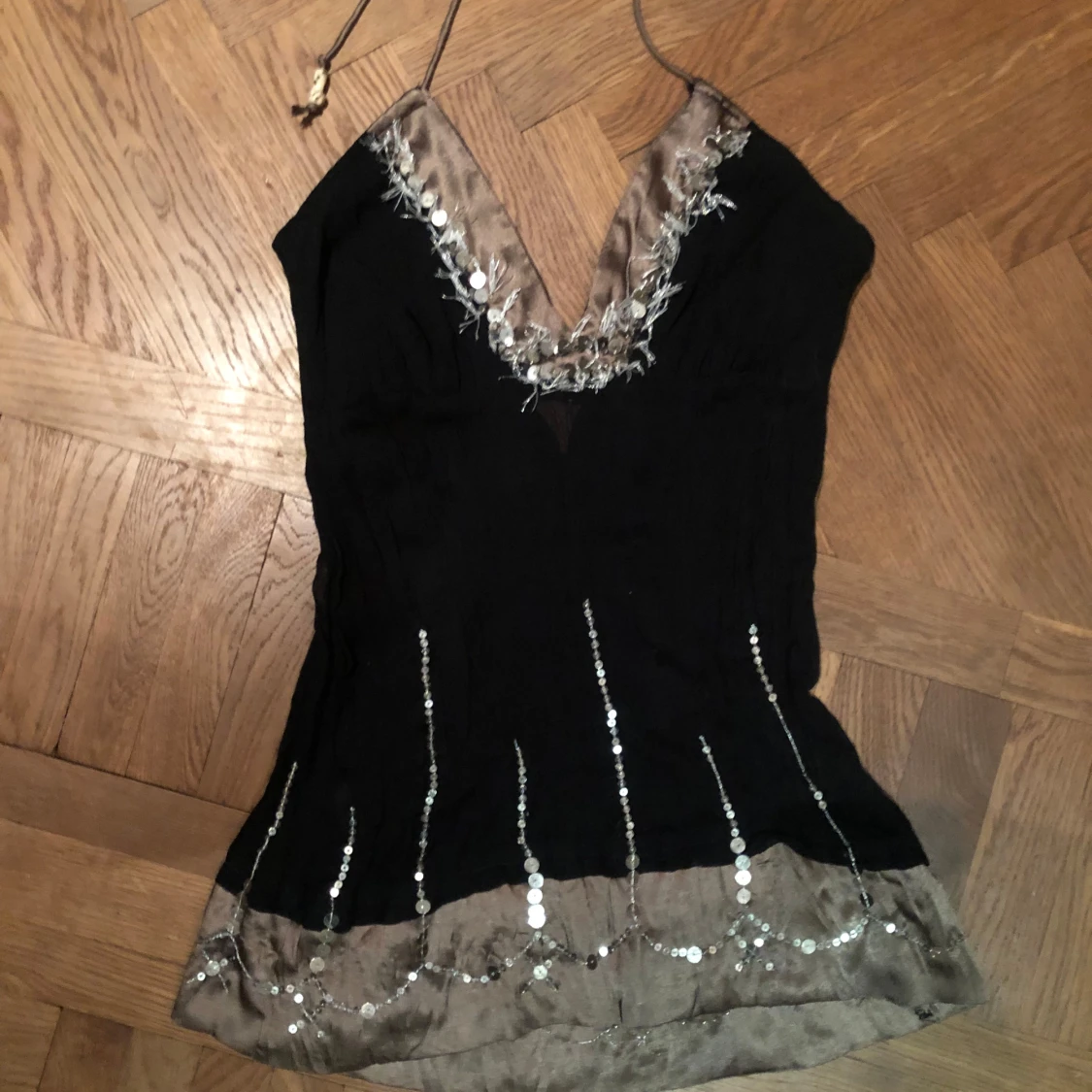 Svart och champagnefärgad paljettopp - 1