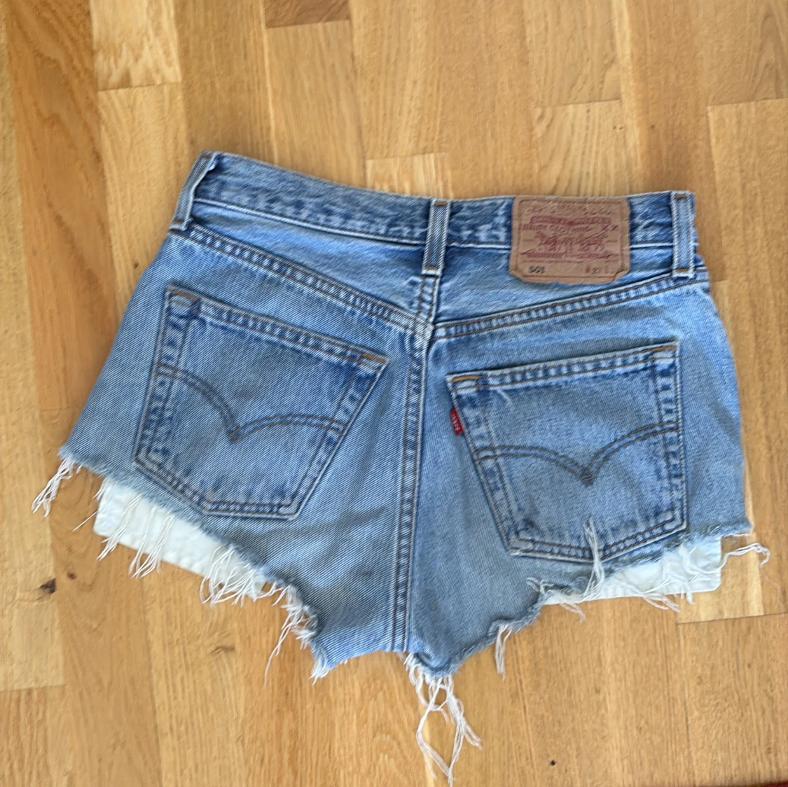 Levi's blå jeansshorts med fransar - 1