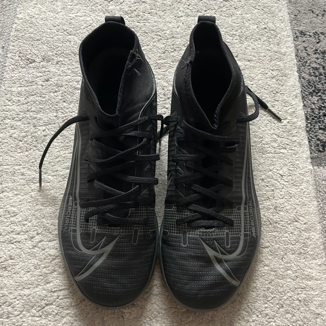 Nike Mercurial svarta fotbollsskor