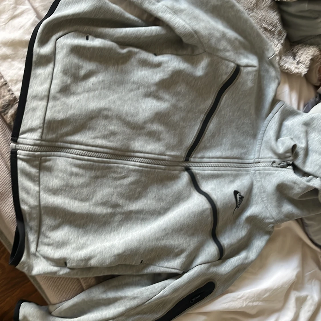 Grå vindjacka från Nike, storlek M barn storlek