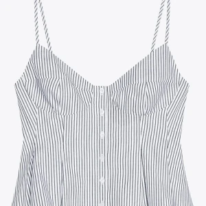 Randig linnetopp med knappar - Säljer en vit och svart randig linnetopp med smala axelband och knappar framtill. Toppen har en söt, lätt utsvängd passform och markerade kupor för en feminin look. Perfekt för varma dagar och enkel att styla med jeans eller kjol.