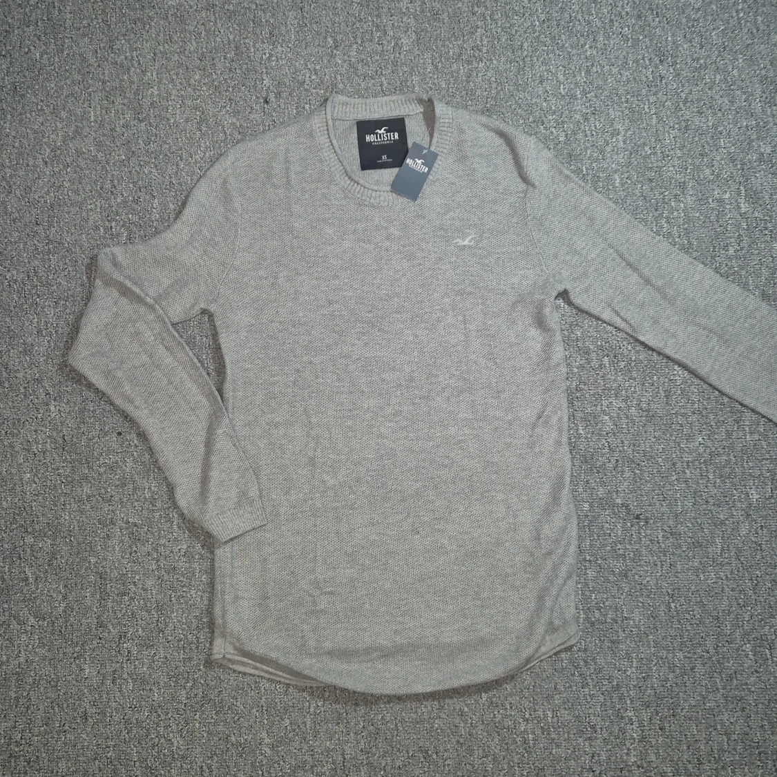 Grå stickad tröja från Hollister