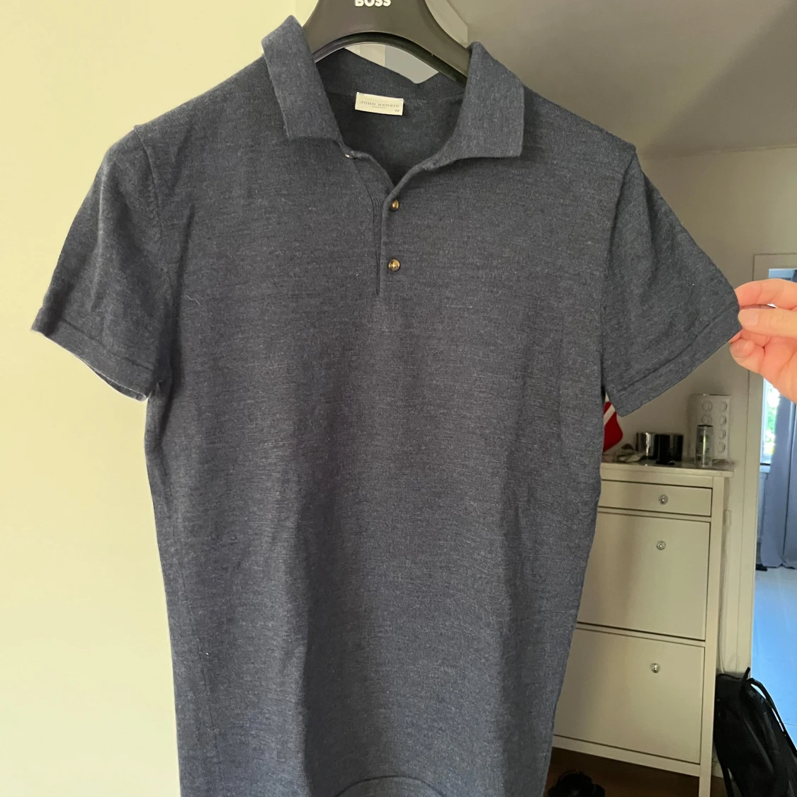 Mörkblå pikétröja i merinoull John Henric