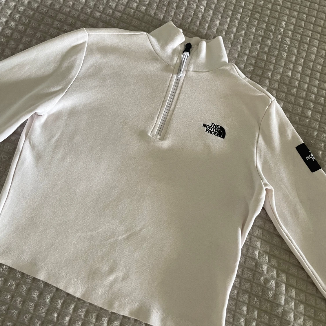 Vit half zip tröja från The North Face