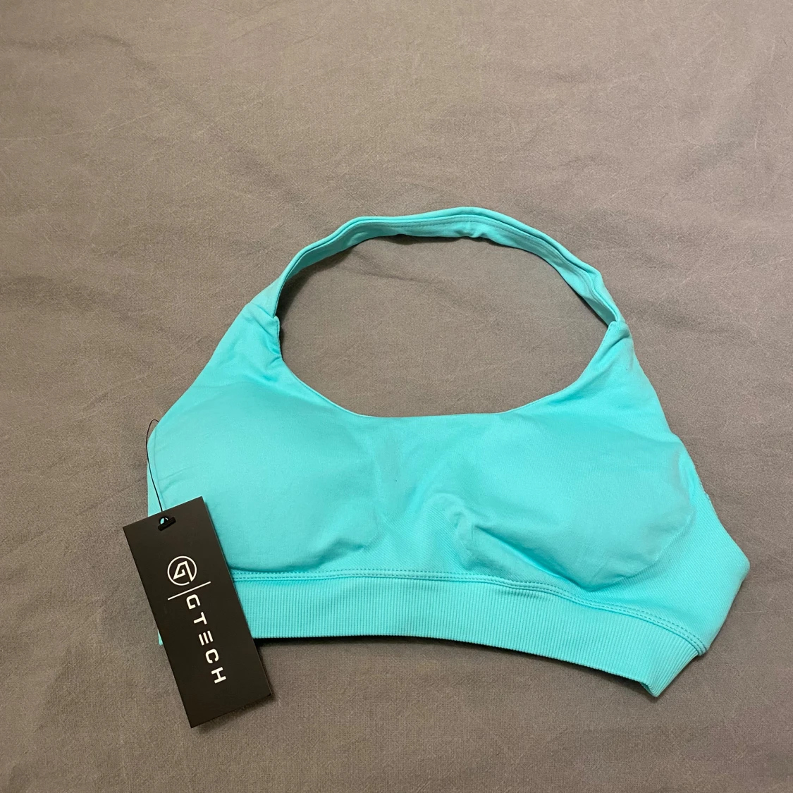 Turkos sporttopp från GTECH