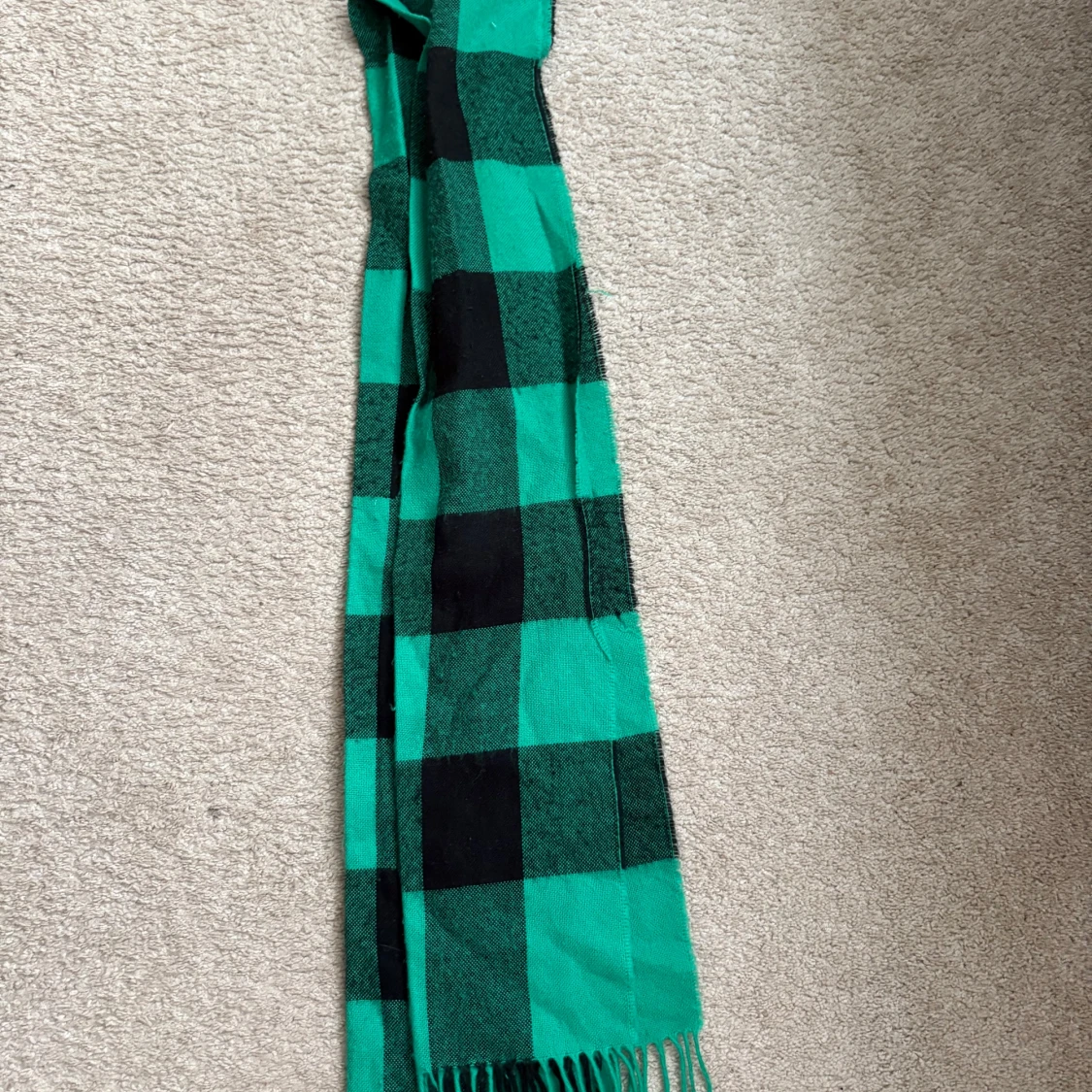 Grön och svart rutig halsduk