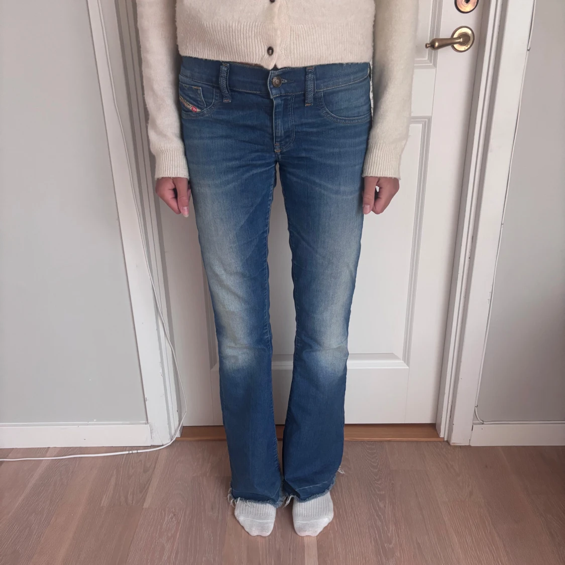Blå lågmidjade bootcut jeans från Diesel