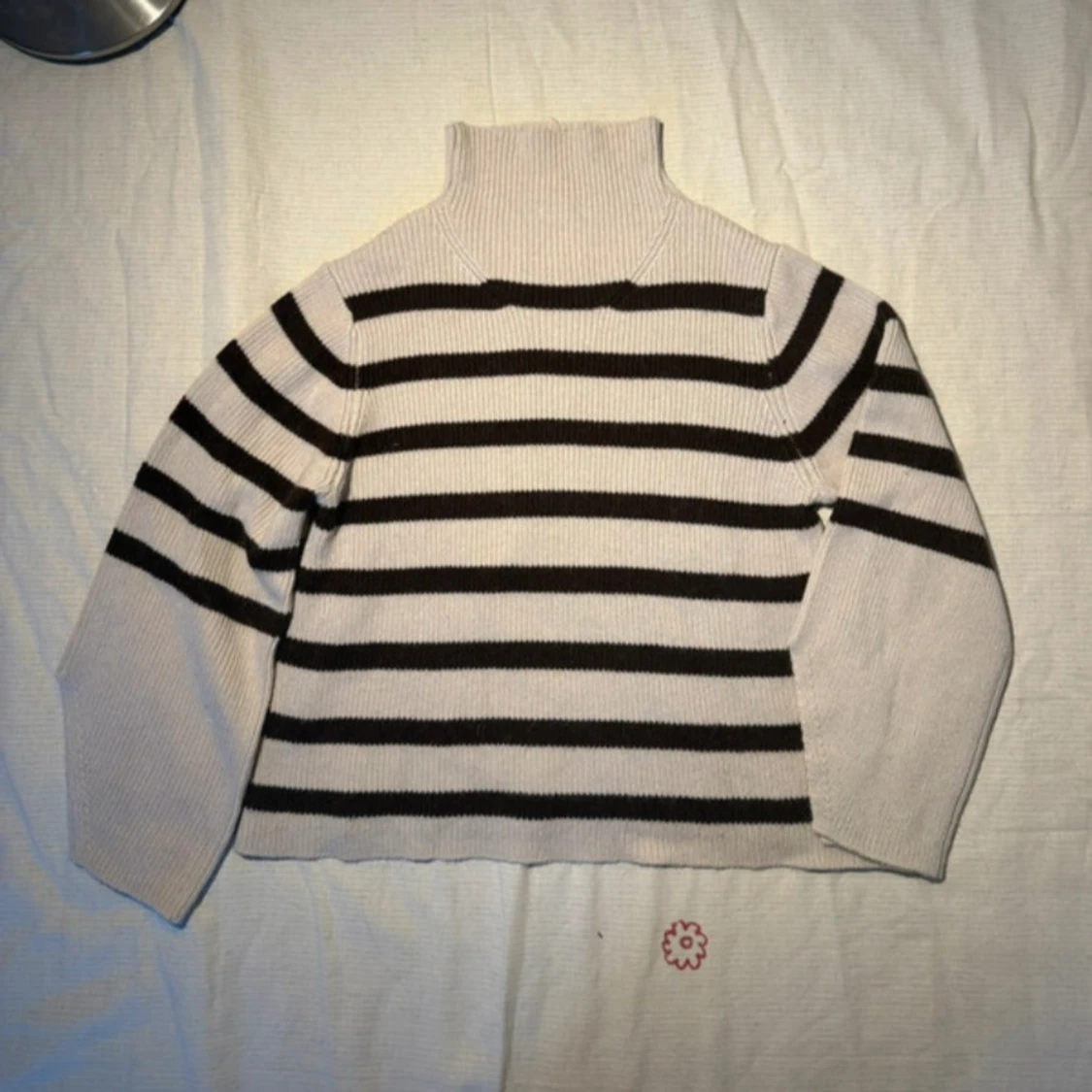 Randig stickad polotröja från Carin Wester