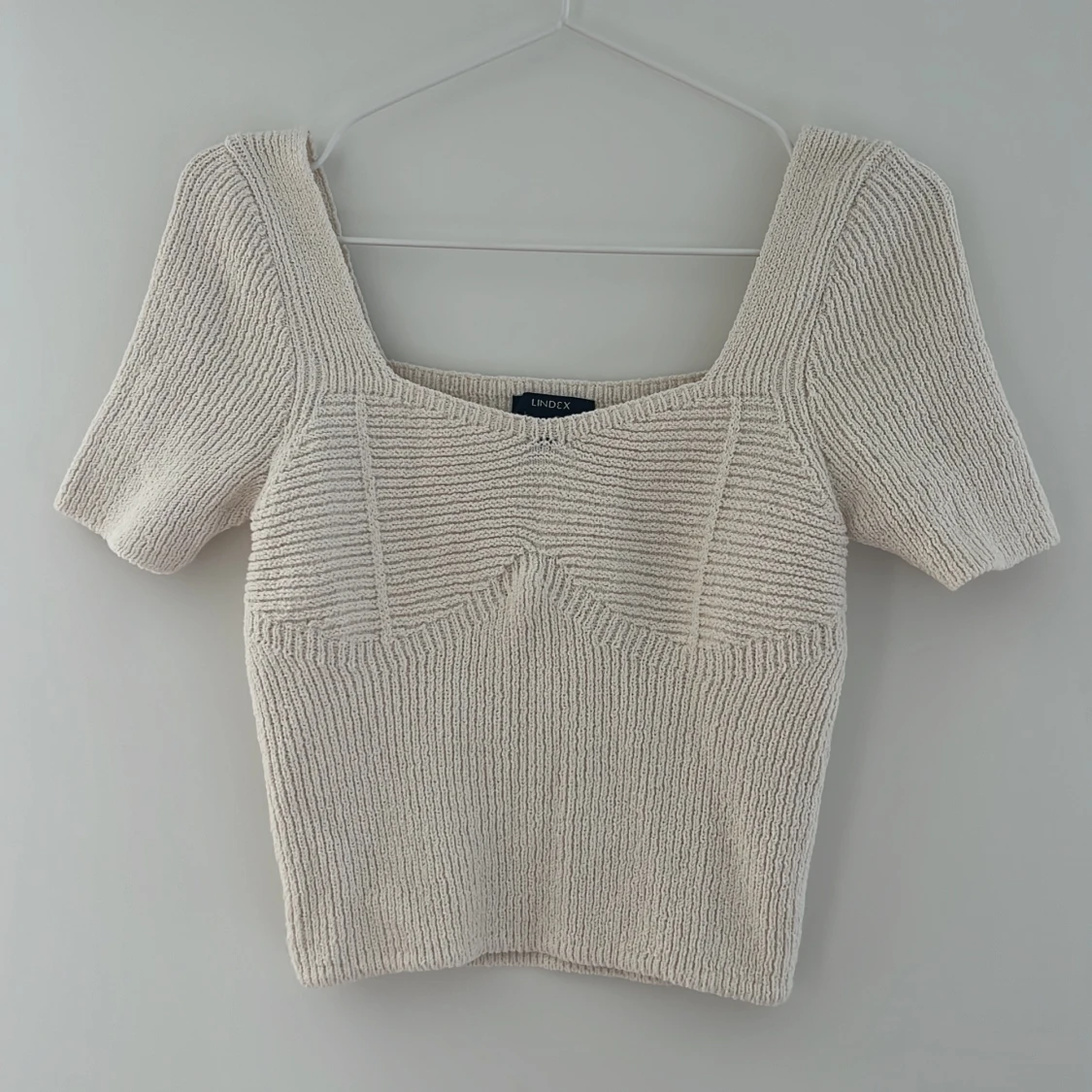 Beige stickad topp från Lindex