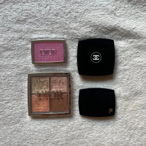 Dior, Chanel och Lancome - Säljer Dior highlighterpalett i Glitz, Dior backstage rouge i rosa, en Chanel ögonskuggspalett och ett rouge från Lancome. Perfekt för att skapa en glamorös look. Pris kan diskuteras.