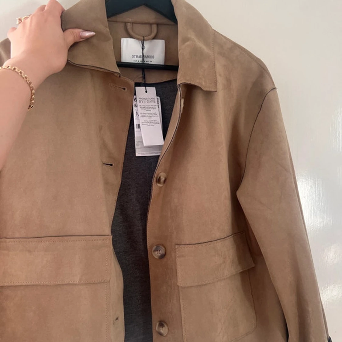 Beige mockajacka från Stradvarius