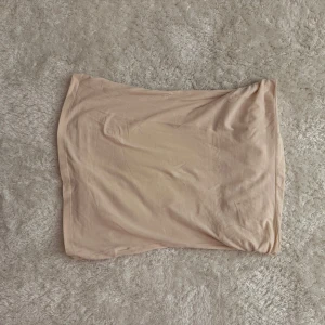Rosa tube top  - Super fin har en mini fläck