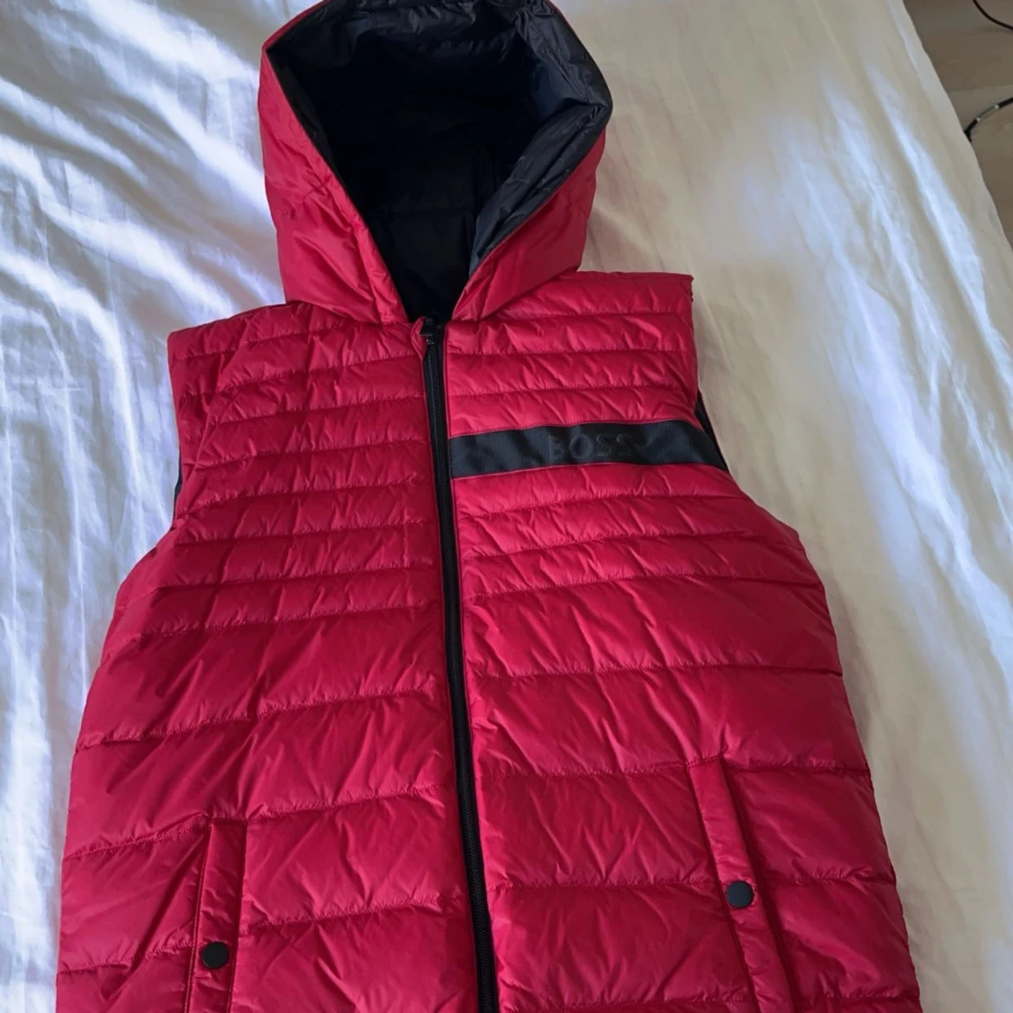 Två färgad boss väst  - 1