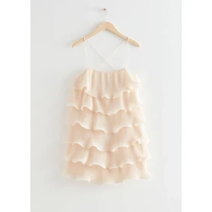 & Otherstories klänning - Jättefin strappy ruffle mini dress från &otherstories. Köpt helt ny här på Plick och endast använd en gång, är som ny i skicket!