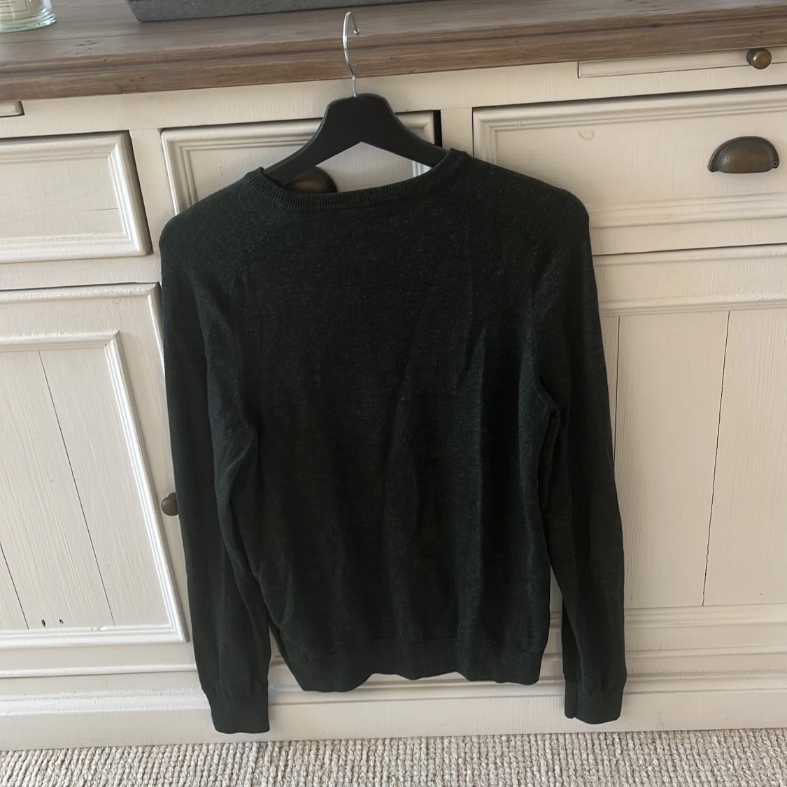 Mörkgrön tröja i merinoull från Morris - 1