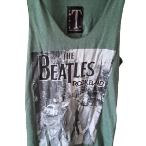 The Beatles linne - Ett linne med The beatles tryck! Har aldrig använt den, i storlek S/M tror jag. Köpt på second hand 💓