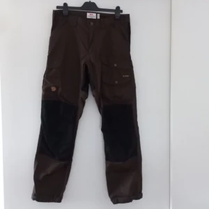 Fjäll Räven byxa G-1000 - Fjällräven byxa G-1000 81760R Vidda pro trousers M, oanvända 