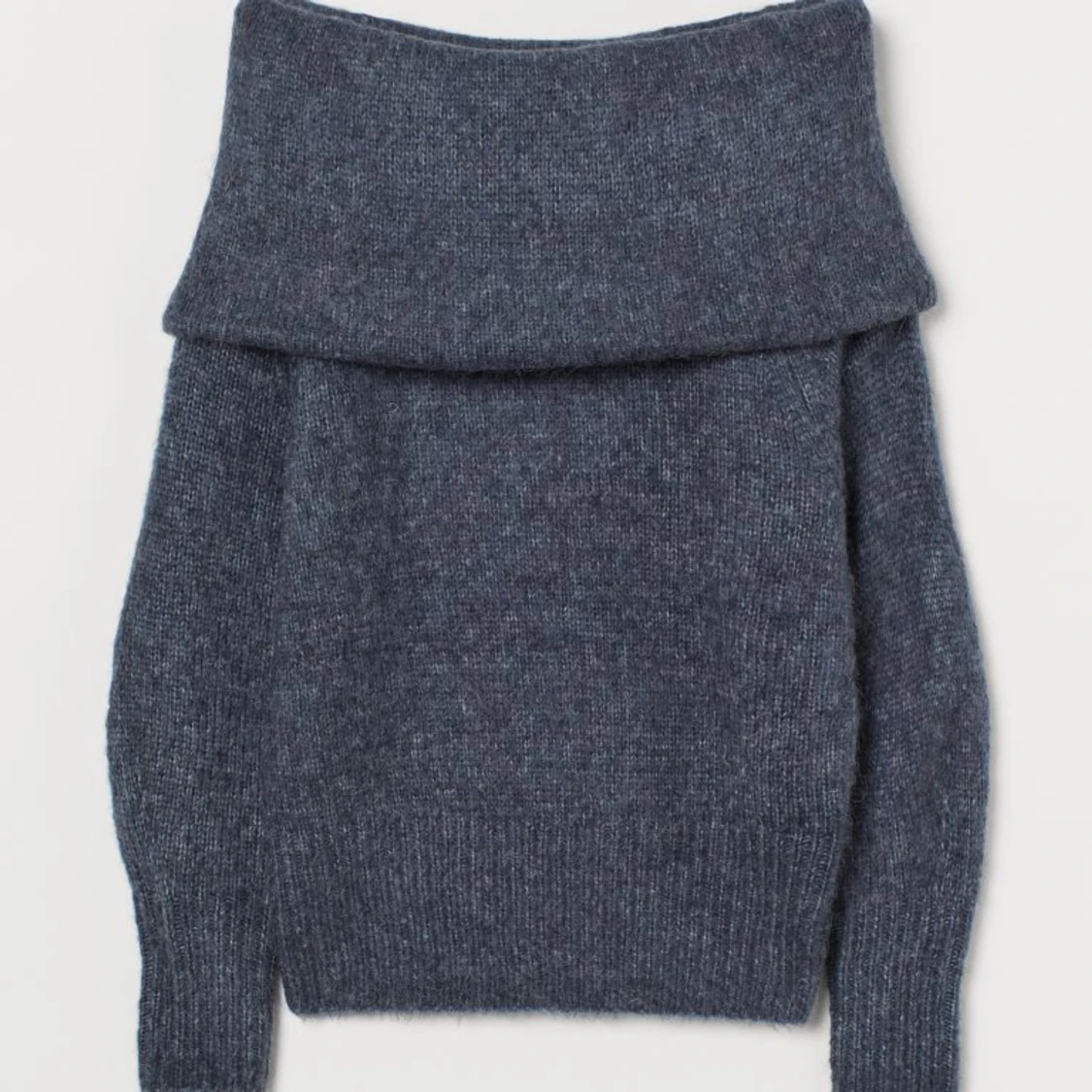 Off shoulder stickad tröja