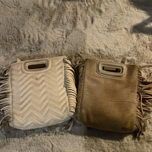 Två maje väskor  - Hej, säljer två stycken snygga använda maje väskor för 1000kr tillsammans. Nypris är nästan 3000 kronor styck. Vi säljer för bra pris pågrund av skicket. Priset kan diskuteras vid snabb affär. Endast seriösa köpare❤️