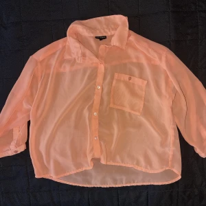 Blus  - Orange blus från kappahl I stl 158. 
