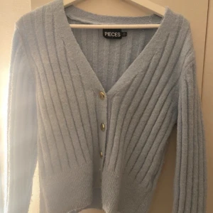 Stickad - Storlek M, aldrig använd 