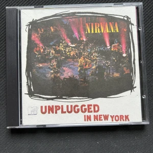 Nirvana Unplugged in new york cd  - skivan är lite repor, se bilder