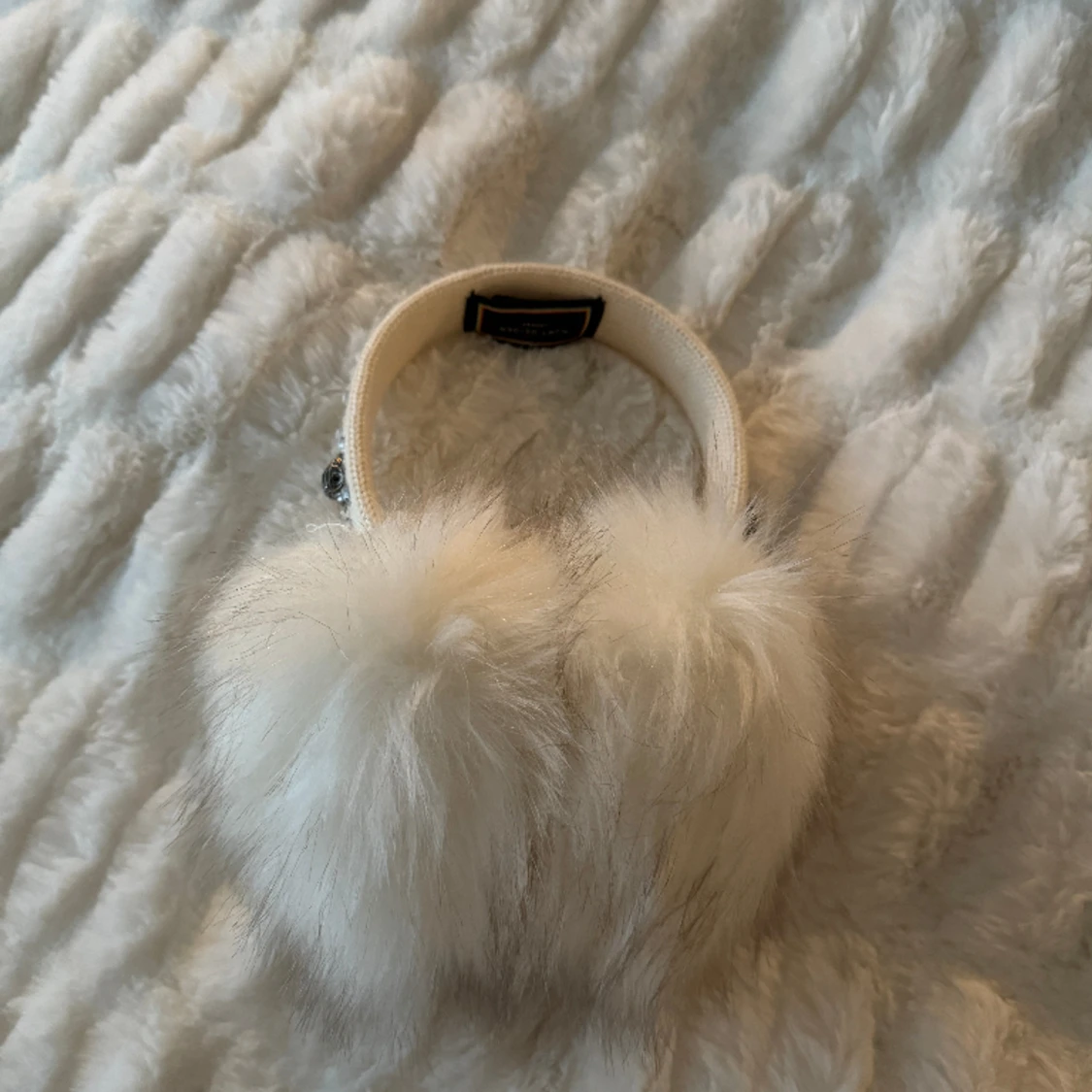 KURT GEIGER ÖRONMUFFAR - 75